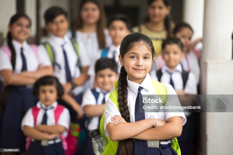 Group of Indian schoolboys and schoolgirls at school campus